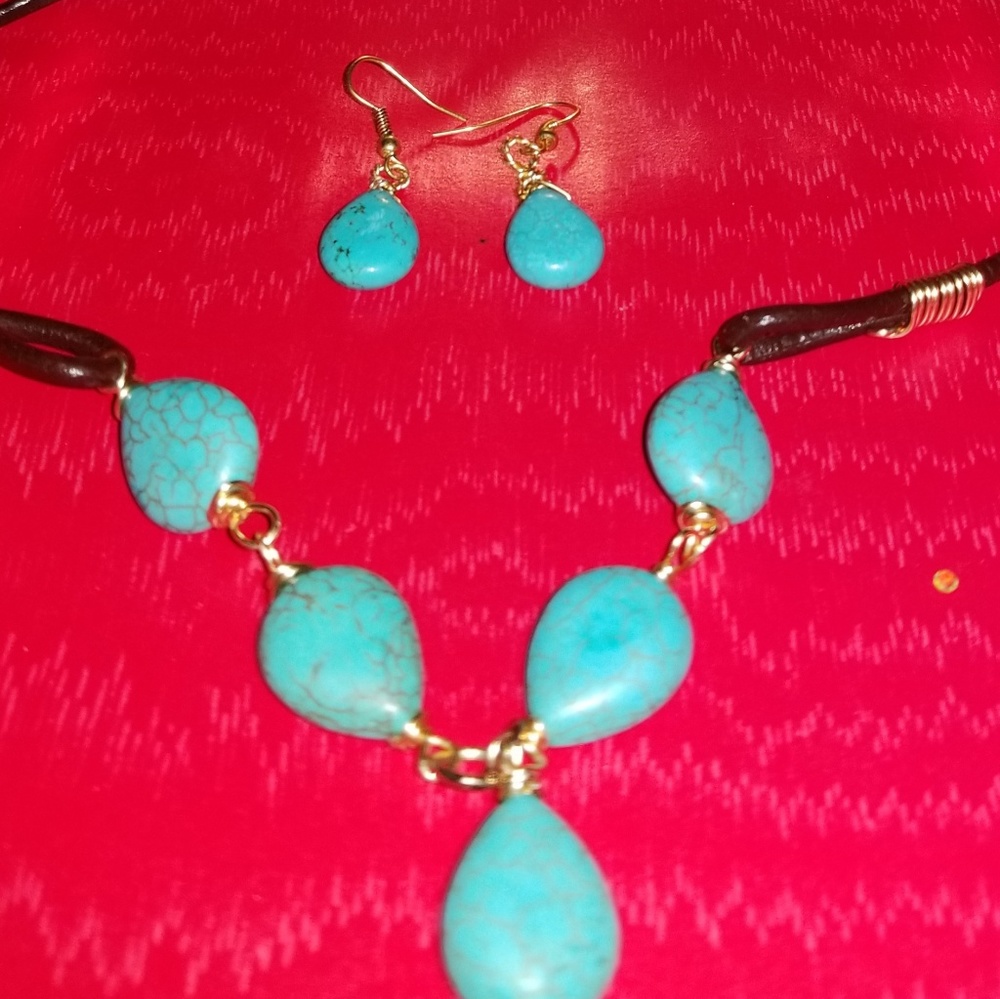 Turquoise set with brown leather and gold